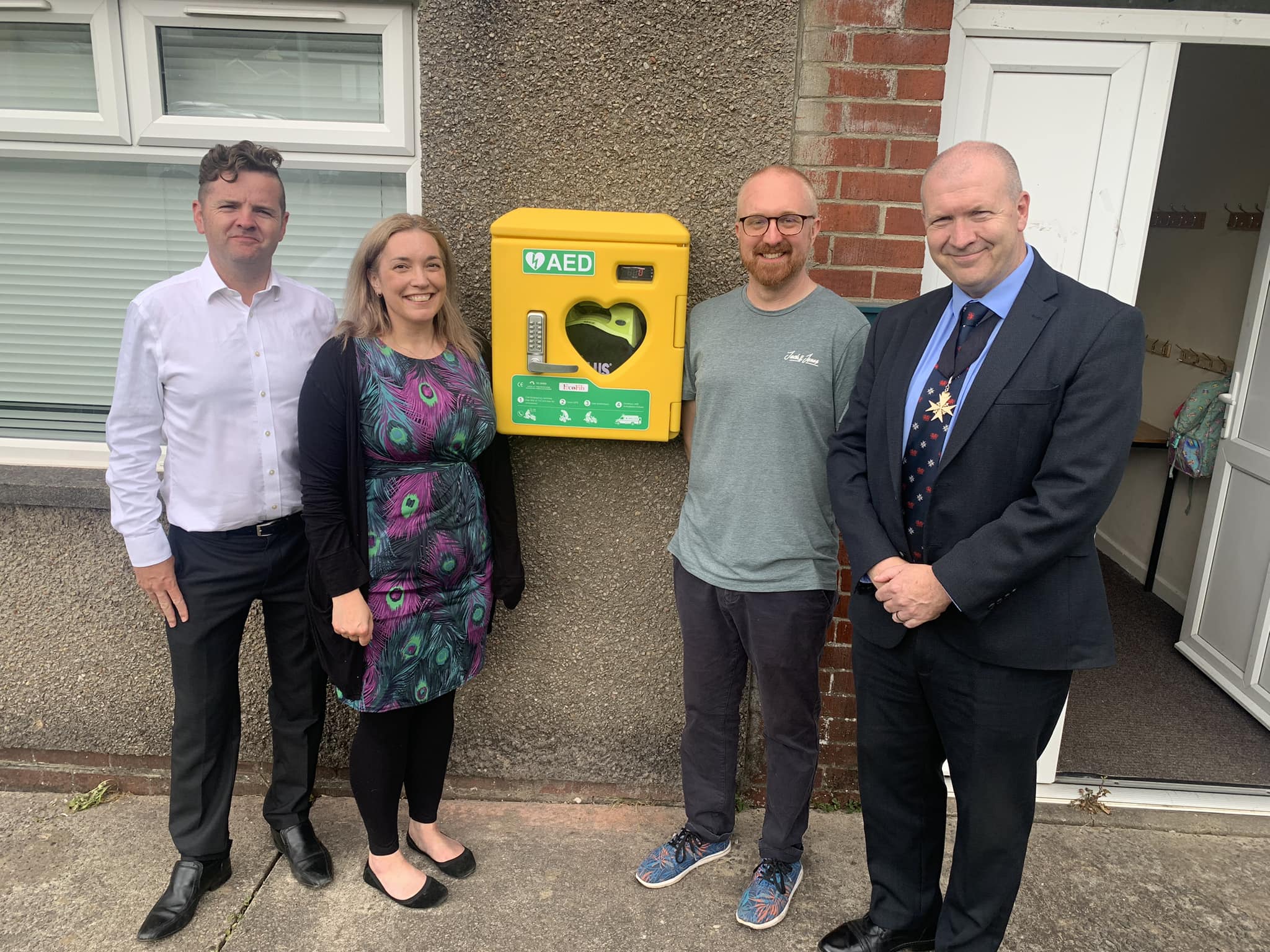 Volunteers install defibrillator to keep Griffithstown safe